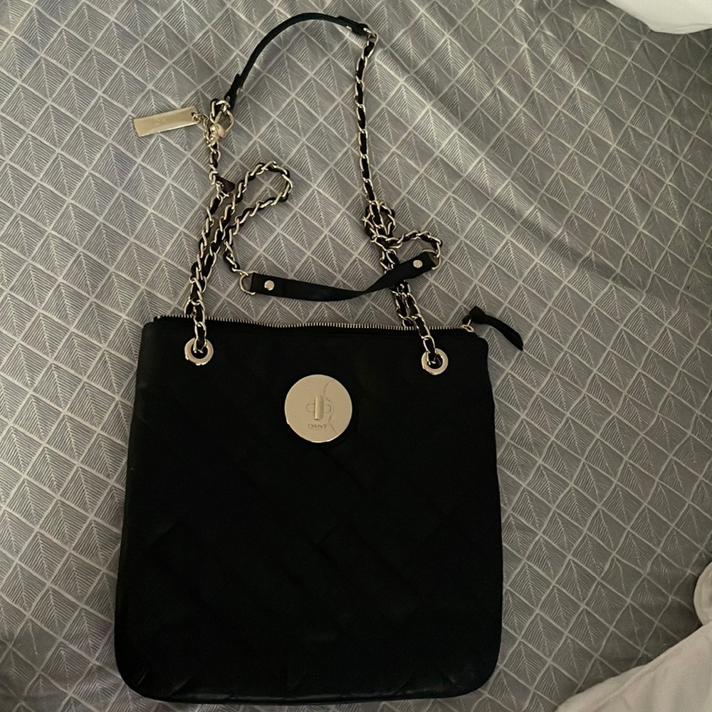 DKNY handbag. Never used. Black leather with gold accents.